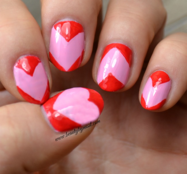 red and pink Valentine's Day themed nail art