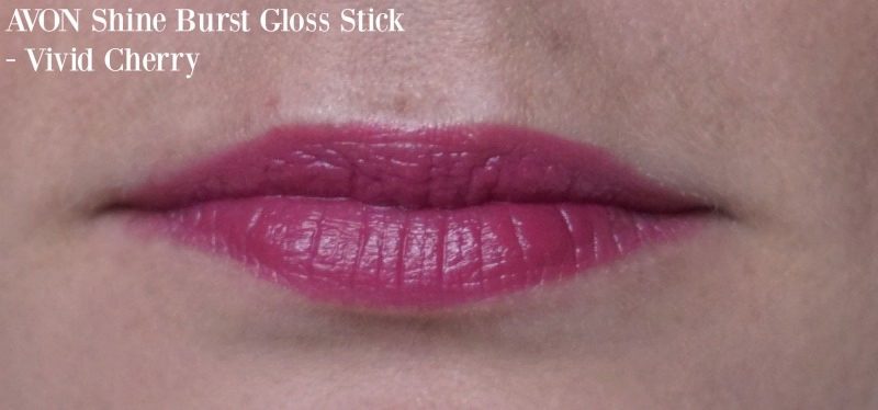 Avon Shine Burst Gloss Stick in Vivid Cherry on my lips
