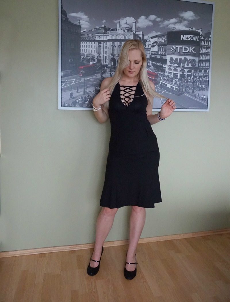 lace up body suit, black skirt, heeled pumps