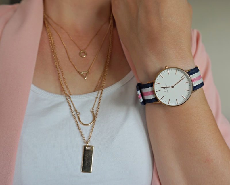 layered necklace and Daniel Wellington watch