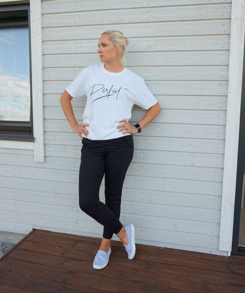 white oversized t-shirt and black joggers from Femme Luxe